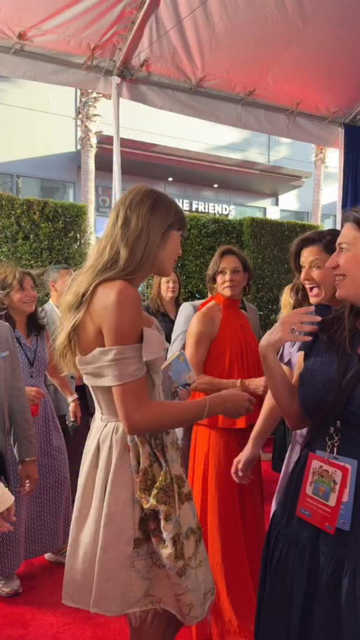 Taylor brings a surprise for cast and filmmakers to sign… her very own original Toy Story VHS