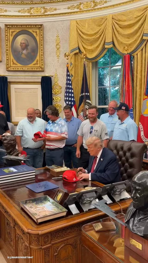 A JOB WELL DONE: President Trump welcomed the workers who renovated the Lincoln Memorial Reflecting Pool to the Oval Office, thanking them for their craftsmanship with signed hats and presidential challenge coins.