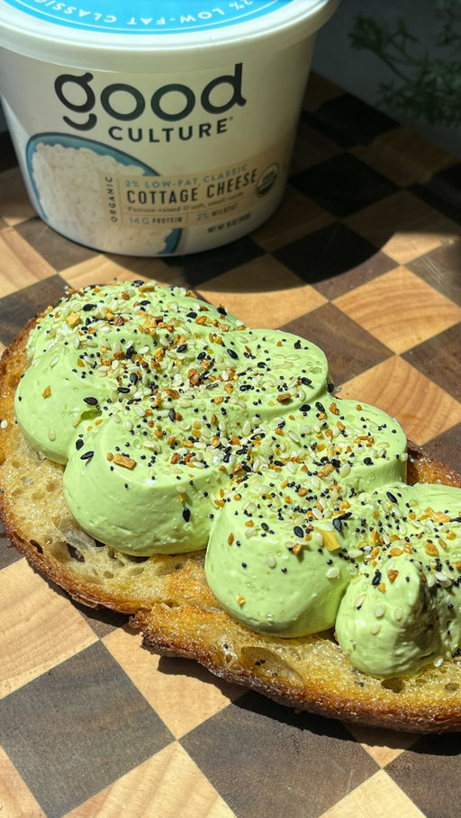 taught an old breakfast a new trick 🥑

Whipped Cottage Cheese & Avocado Toast

Ingredients:
• 1 piece sourdough bread 
• 1/2 tbsp butter
• 1 ripe avocado
• 3/4 cup Good Culture Cottage Cheese
• Everything bagel seasoning, sea salt, pepper

Method:
1. To the base of a small food processor or immersion blender, add: avocado, cottage cheese, and a pinch of sea salt. Blend until smooth and creamy. Transfer to a piping bag & place in the refrigerator while preparing the toast.
2. Over medium heat, melt butter in a small pan. Add sourdough and cook on both sides to desired doneness. 
3. Pipe cottage cheese + avocado mixture onto sourdough toast. Top with everything bagel seasoning, sea salt, & black pepper. Serve & enjoy!