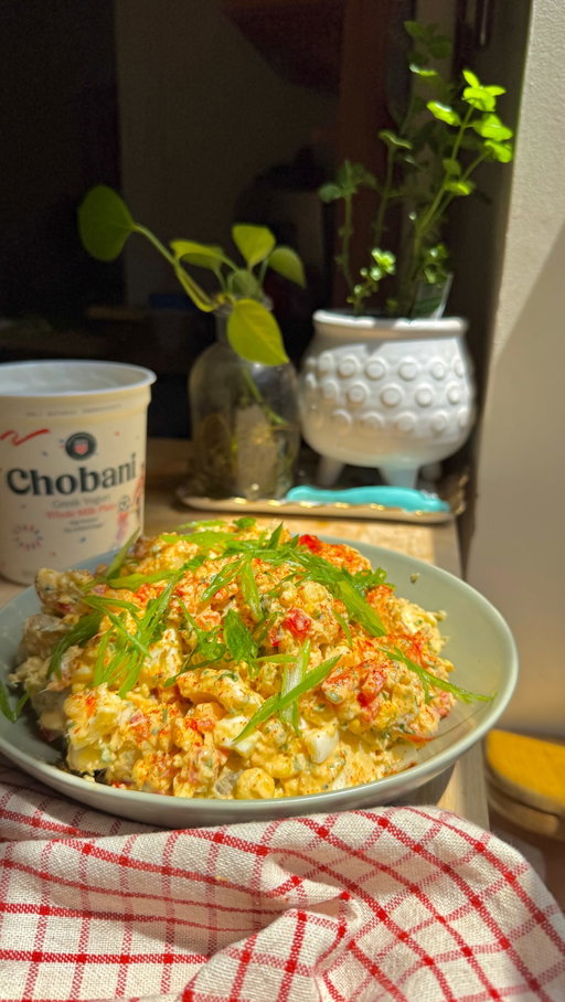 #ad Looking to put a twist on your potato salad? Make it Paraguayan style with @chobani Greek Yogurt.

@chobani is the Official Nutrition partner of the @usmnt and I’ve teamed up with them to share my favorite ways to Feed the Dream with nutritious meals inspired by the countries the US Soccer team is facing off in Group D.

This potato salad is inspired by Mandi’o Chyryry, a traditional dish by the Guarani native people of Paraguay. Yuca, red bell peppers, and corn with a spiced-zesty Greek Yogurt dressing makes this the most nutritious texture story to serve at any watch party ⚽
️
Here’s how to make it!
2lbs fresh yuca, peeled and cut into 2-inch chunks
4 large eggs, hard-boiled and roughly chopped
3 scallions, thinly sliced
1 red bell pepper, finely diced
½ cup fresh corn kernels
1/2 cup Chobani® Whole Milk Plain Greek Yogurt
Zest of 1 lime 
1/4 tsp cumin
½ tsp oregano
1/2 tsp smoked paprika
1 garlic cloves, minced
1/3 cups fresh parsley, roughly chopped
1/3 cups fresh cilantro, roughly chopped

Instructions:
Cook the yuca in heavily salted boiling water for 25-30 mins until tender when pierced with a fork. Drain and let cool.
Once cool enough to handle, break the yuca into rough bite-sized chunks with your hands or a fork. Discard any remaining fibrous strands you find.
Make the yogurt dressing: In a large bowl, whisk together the Greek Yogurt, lime zest, cumin, paprika, garlic, oregano and season with salt to taste
Add the warm yuca to the dressing and fold gently to coat. Add the bell pepper, and then fold them into the salad.
Gently fold in the eggs, chopped parsley, chopped cilantro.
Cover and refrigerate for at least 1 hour. Before serving, fold gently, taste and adjust seasoning if needed (salt or lime juice). Garnish with scallions and a dusting of smoked paprika.

#summerfood #easyrecipes #salad