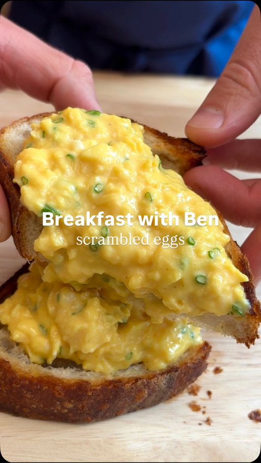 How to Make Gordon Ramsay’s Scrambled Eggs ⭐️⭐️⭐️ - BREAKFAST WITH BEN

FULL RECIPE BELOW ⬇️ 

NOTE: For an in-depth look at Gordon’s recipe, check out any of his videos. He has multiple across platforms, and he’ll be able to explain his recipe better than I can. 

- MY RECIPE - 

INGREDIENTS:
4 large eggs
1 tbsp unsalted butter
Fine sea salt (to taste)
1/4 bunch chives 

1. Start by finely cutting your chives as thinly as possible.
2. Pre-heat a good non-stick pan over medium heat for 1-2 minutes. In the meantime time, crack your eggs into a bowl and beat them with a fork until homogeneous. If you want to go the extra mile, pass your eggs through a fine mesh strainer to ensure they are extra smooth. 
3. Add your butter to the pan, and once it is completely melted and starts to foam, add your eggs. Immediately turn the heat down to medium-low. Start stirring your eggs with a spatula, but not "risotto-style" like Gordon does - you want your egg to form nice small curds in the pan as you stir. The best motion to use is a "figure 8" pattern, where you bring the egg from the outside edge of the pan (where the egg cooks faster), towards the inside of the pan. While doing this, move your pan on and of the heat to control the temperature of the pan. You do not want your eggs catching or scorching.
4. What I’m looking for when cooking scrambled eggs is the point where the eggs have just started to set (they do not run around the pan when you tilt it), but they are still wet to the touch. This is when you should season your eggs with salt (and pepper if you’d like), and serve immediately. Even if your eggs seem slightly undercooked, residual heat will continue to cook them, so it is best to serve them at this point. 
5. Garnish with your chopped chives, and enjoy!

#scrambled #egg #scrambledegg #homecooking #recipe