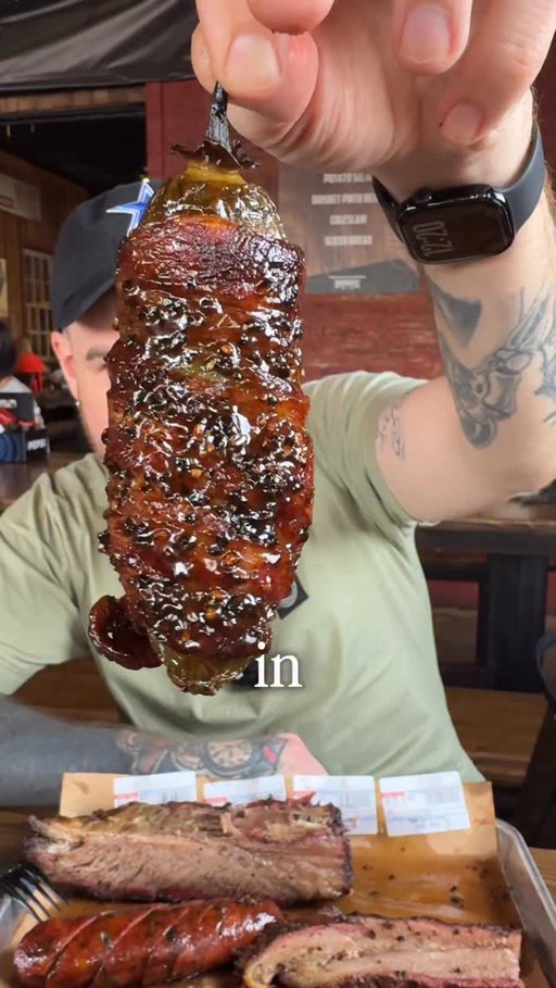 TEXAS TWINKY 🇺🇸

This invention by @hutchins_bbq might just be the most American thing in the world.

A giant jalapeño, stuffed with brisket and cream cheese, wrapped in bacon, doused in BBQ sauce and smoked 😮‍💨