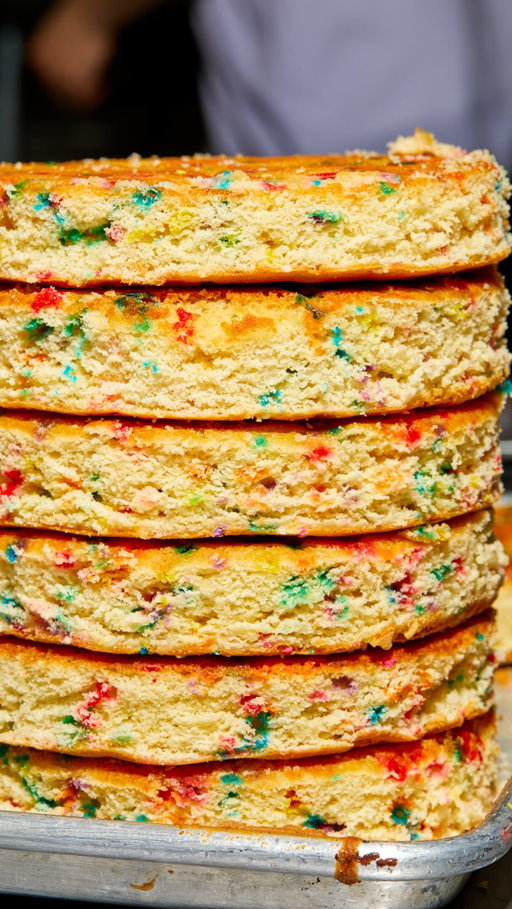 Hilly, Milk Bar’s R&D Manager, takes us behind the scenes of how we build our iconic cakes 🤩 

Whole cakes and slices available in all bakeries + nationwide shipping at milkbrstore.com!