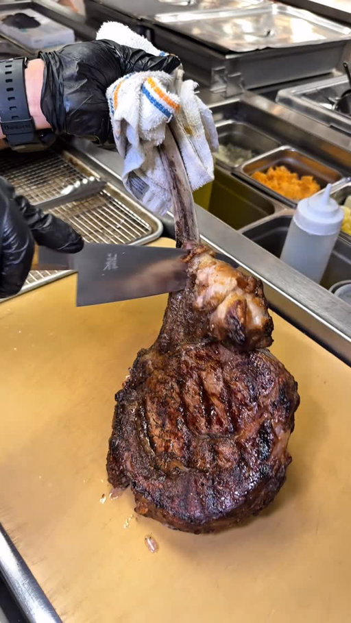 C's Tomahawk @carversteak is a beast featuring 50oz of Australian Wagyu Westholme beef finished with red wine shallot butter and blistered peppers for $325!