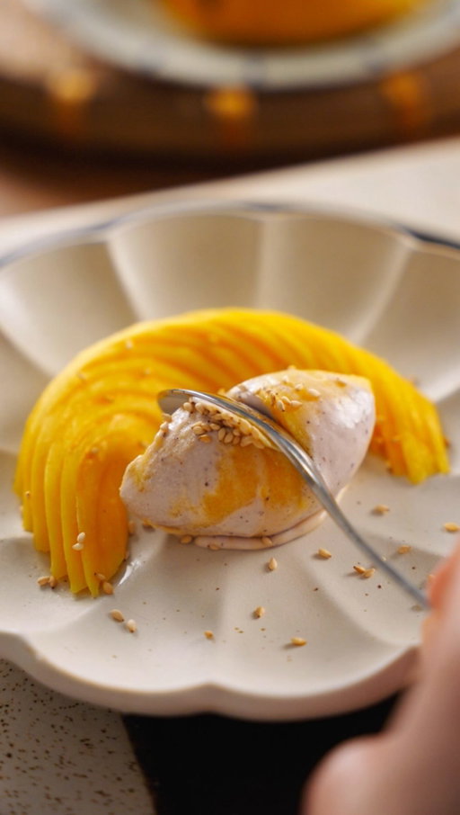 Mango Swirled Thai Sticky Rice Cream. 

🥥 Black glutinous rice coconut base
🥭 Tart mango sorbet

Made this flavour for the first time last year, and after many more batches, this iteration is definitely the best—thanks for the mango sorbet suggestions! Want to see a specific flavour? Leave me a comment

✨ Find the recipe for this on my Substack.