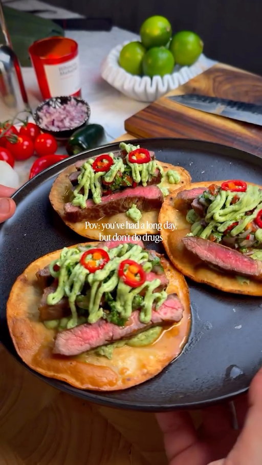My type of drug! Crispy Steak Tostadas, vibrant Chilean pebre, and silky avocado crema. This recipe brings together savory, fresh flavors in every bite. 

Comment or DM if you want the recipe as a image 🙏🏽✨

Ingredients
For the Steak
	•	1 lb NY strip steak
	•	1 tablespoon olive oil
	•	1 teaspoon salt
	•	½ teaspoon black pepper
For the Pebre Chileno
	•	2 Roma tomatoes, finely diced
	•	½ shallot, finely diced
	•	1 jalapeño or chili, seeded and minced
	•	¼ cup fresh cilantro, chopped
	•	¼ cup fresh parsley, chopped
	•	2 tablespoons olive oil
	•	Juice of 1 lime
	•	Salt and pepper, to taste
For the Avocado Crema
	•	2 ripe avocados
	•	¼ cup sour cream or yogurt
	•	Juice of 1 lime
	•	1 garlic clove
	•	2 tablespoons cilantro
	•	Salt, to taste

Instructions

1. Prepare the Pebre
In a bowl, combine the tomatoes, red onion, jalapeño, cilantro, parsley, olive oil, and lime juice. Season with salt and pepper. Let stand for at least 15 minutes to allow the flavors to develop.

2. Make the Avocado Crema
Add the avocados, sour cream, lime juice, garlic, cilantro, and salt to a blender or food processor. Blend until smooth, adding a splash of water if needed to create a creamy, drizzleable sauce.

3. Cook the Steak
Pat the NY strip dry and season generously with salt and black pepper. Heat a cast-iron skillet or grill over high heat. Cook the steak for 3–4 minutes per side for medium-rare, or to your desired doneness. Let rest for 5–10 minutes before slicing thinly against the grain.

4. Assemble the Tostadas
Spread a layer of shredded lettuce or cabbage over each tostada shell. Top with sliced NY strip steak, followed by a generous spoonful of pebre chileno.

5. Finish and Serve
Drizzle with avocado crema and garnish with queso fresco, extra cilantro, and a squeeze of fresh lime. Serve immediately while the tostadas are crisp.

#reels #explore #tostadas #steak #pebre