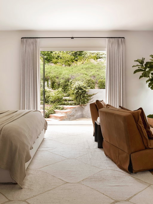 I love this bedroom from our Hutton Drive project.

The older I get, the more I believe luxury is a feeling.

Natural light. Doors left open. Linen sheets. A comfortable chair. A view of something green.

Sometimes that’s all you need.