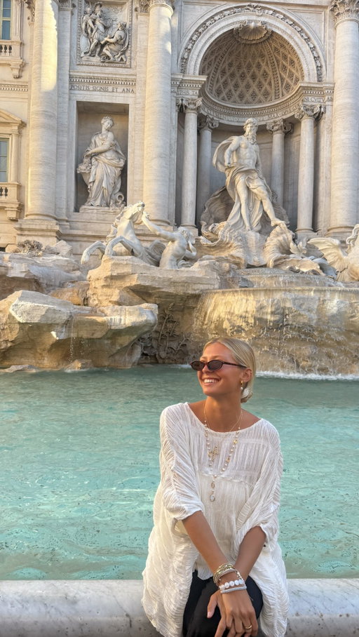 at the trevi fountain of all places 😭 what the heck is this real life