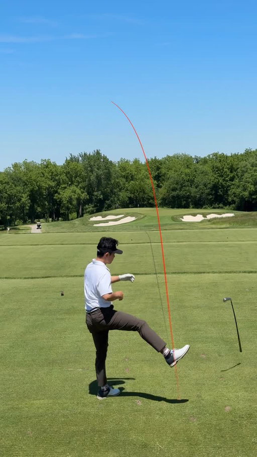 Nice little low fade 3 iron to hold it up against the wind
