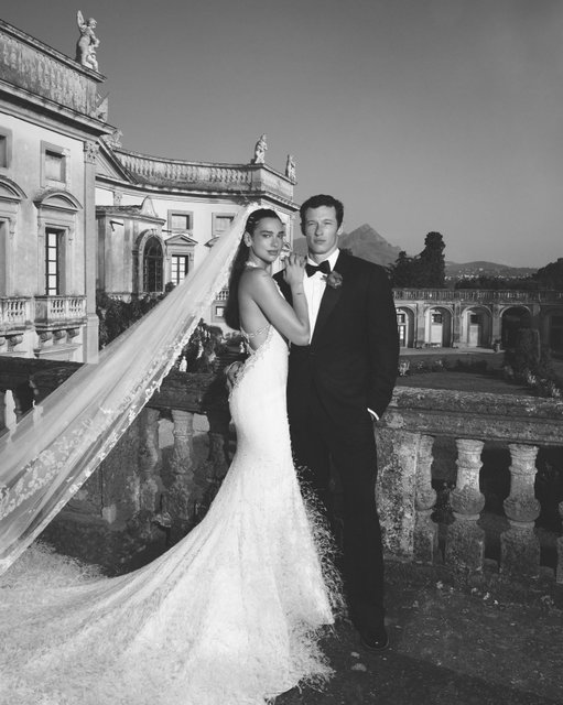 @DuaLipa and Callum Turner's wedding celebrations have been quite the spectacle, but we've all been wondering what the pop star wore for the main event in Sicily. Today she revealed it to be a feather and crystal embellished @ChanelOfficial Haute Couture gown—the first designed by @Matthieu_Blazy. Her groom, Callum, wore a custom @LouisVuitton suit. Head to the link in our bio for more photos and for all the details on the newlyweds' looks. Photos: @davidsimsofficial.