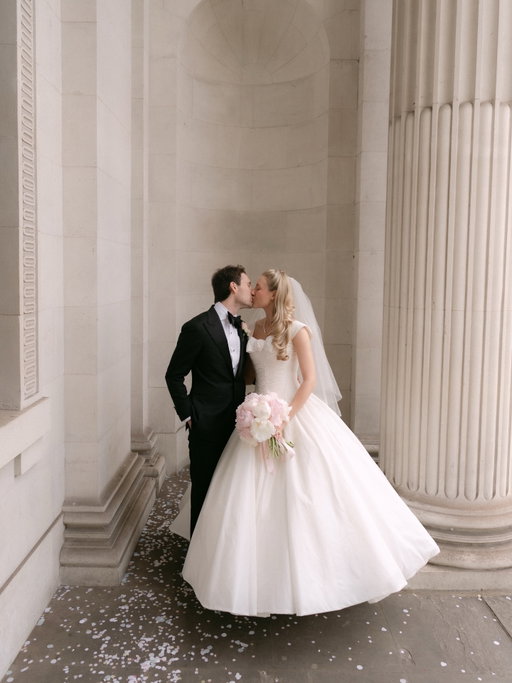 Chapter three, The Wedding! 🤍💍
I decided when I was fifteen that I would marry JJ at the Old Marylebone Town Hall- we went to school together around the corner and passed it every day for years. Back then, I thought you had to choose between a church or a town hall, so I thought yes, this one is perfect! I can’t describe the surreal and magical feeling of having that teenage dream come true (he wasn’t even my boyfriend, so I was dreaming big!). I was late, of course. I was escorted from The Ritz in a London black cab by a close family friend who has known me since I was born. I said “Can you get us to the town hall in five minutes?”, and he said “I’ll get you there in three!”. I walked down the aisle to a string trio playing “Once upon a dream”, another detail I planned as a little girl. Our ceremony was simple, but brimming with emotion- even our wonderful registrar, who has performed hundreds of marriages, was brought to tears more than once! Placing a ring on the finger of my first and forever love, is an unforgettable feeling. Why do they suddenly become EVEN MORE handsome with a wedding ring on? Having our turn walking down those famous steps, with our beaming friends and family showering us in confetti, felt like something out of an old film. We also had a surprise visit from a chimney sweep- an age old lucky wedding tradition that my parents also had, and sent our guests on to the reception in a vintage bus, another element inspired by my parents’ wedding. It was perfect- exactly what we’d always imagined and more 🤍