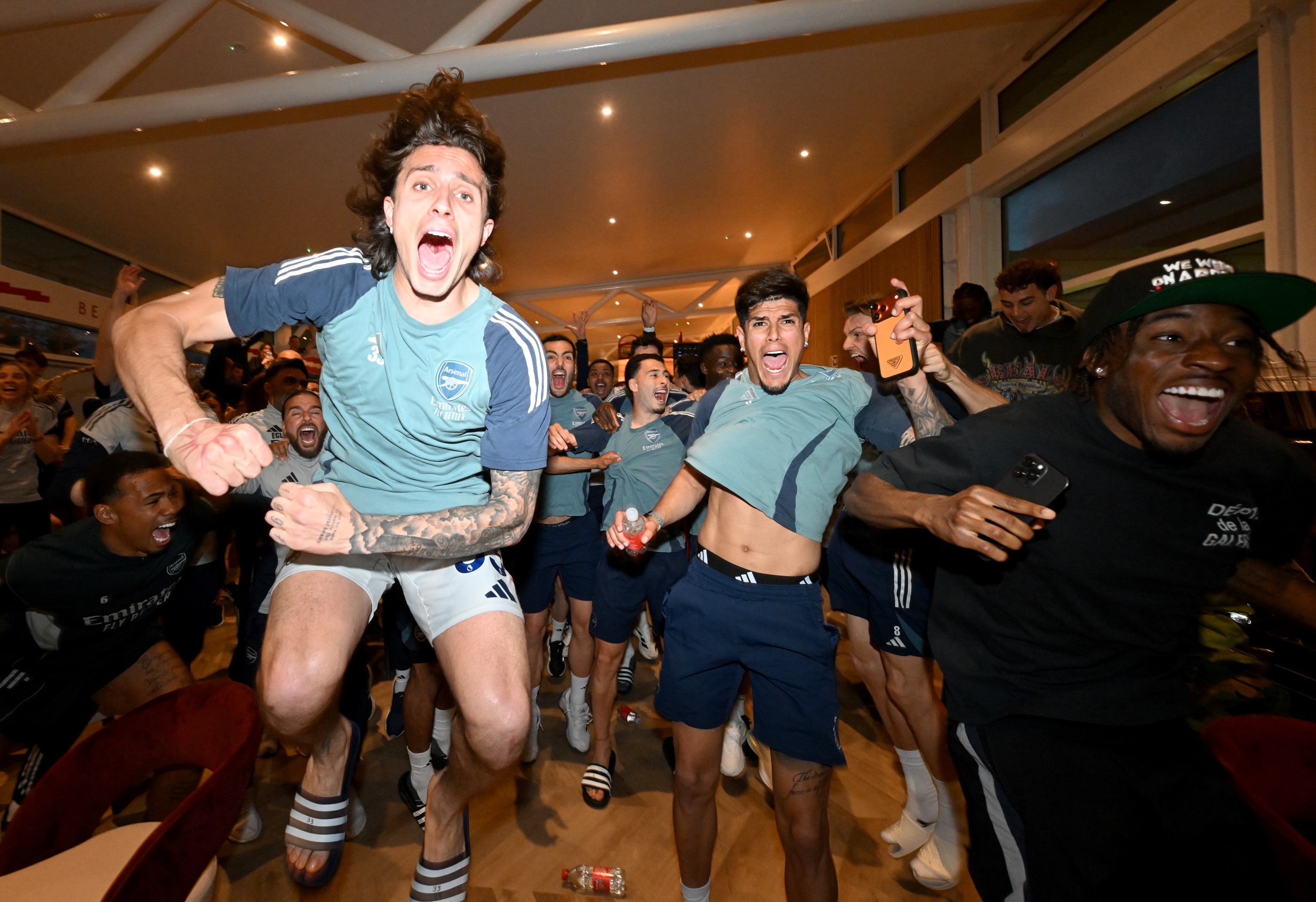 The best of Stuart MacFarlane’s photos from the 2025/26 season 📸

1. The moment we win the Premier League. I love the expressions on their faces, they know what’s happening but can’t celebrate until the final whistle.

2. “It’s Not Done” - Declan Rice after the defeat at the Etihad. I wouldn’t normally select a picture from a loss, but this was such a powerful moment from the season. 

3. William Saliba with his feet up on the Premier League trophy after Crystal Palace away. Celebrations done, time to relax for William.

4. The moment we were all waiting for, Arsenal captain Martin Odegaard lifts the Premier League trophy. 22 years and it was worth the wait.

5. Eberechi Eze celebrates scoring the first Arsenal goal vs Bayer Leverkusen.

6. Bukayo Saka with the Premier League trophy after Crystal Palace away. A lovely moment for Bukayo.

7. Arsenal Co-Chair Josh Kroenke with Gabriel and William Saliba during the Premier League Winners Parade. They loved Josh’s t-shirt so I had to get a picture of them all together.

8. Declan Rice, Mikel Merino, Bukayo Saka, Viktor Gyokeres and David Raya watch AFC Bournemouth v Manchester City at Sobha Realty Training Centre. Probably the most stressful 96 minutes of the Arsenal career but what followed was just incredible.

9. Arsenal tifo and lightshow before the UEFA Champions League 25/26 Semi- Final second leg between Arsenal and Atletico de Madrid. This was shot on a remote camera I fixed to the roof of the stadium on the morning of the match.

10. Arsenal supporters at the Premier League Winners Parade on May 31. I’ve covered every parade since 1991 and this was the biggest and best I’ve worked on.