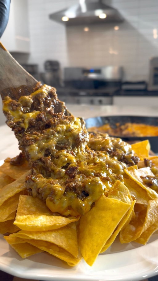 If your skillet nachos don’t make somebody say “that’s too much,” add more cheese. I don’t know who created this first so tag ‘em 🔥🔥🔥They were 💯

Skillet Nachos

Ingredients:

2 lbs ground beef
1/2 white onion, diced
16 oz shredded cheese
8 oz chunky salsa
2 to 3 tablespoons taco seasoning
Tortilla chips
Toppings of choice

Directions:

Cook the ground beef and onion in a skillet over medium heat until browned. Drain if needed.

Stir in taco seasoning and salsa, then simmer on low for 2 to 3 minutes.

Cover the meat with shredded cheese, place a lid on top, and heat on low until melted.

Spoon over tortilla chips and finish with your favorite toppings.

Homemade Taco Seasoning
Ingredients:

1/4 cup chili powder
1 teaspoon garlic powder
1 teaspoon onion powder
1/2 teaspoon cayenne pepper
1 teaspoon dried oregano
2 teaspoons paprika
3 tablespoons ground cumin
1 tablespoon kosher salt
2 teaspoons coarse ground black pepper

Directions:

Add all of the seasonings to a small coffee grinder or food processor. Pulse a few times until everything is evenly mixed and the oregano breaks down into the spice blend.

Transfer the seasoning to a small airtight jar and store it in a cool, dry place.

Use 3 tablespoons of this mix as a substitute for one 1.25 ounce packet of taco seasoning. For tacos, add it to your cooked meat with a small splash of water and let it simmer until the seasoning coats everything nicely.

#nachos #mexicanfood #cheese #food #foodstagram