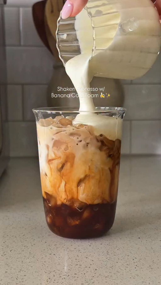 🍌✨ what could possibly make a brown sugar shaken espresso better?! Banana cold foam of course 🤤 

Recipe: 
2 shots espresso brewed over 1 tsp brown sugar, 1 tsp vanilla bean paste 
-shake over ice 
-Add ice & milk 

Cold foam: 
2 tbsp heavy cream 
2 tsp banana cream instant pudding mix- froth and pour over coffee 

#coffee #shakenespresso #coffeeathome #coffeerecipe #icedcoffee