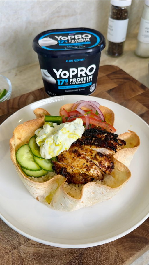 Greek Chicken Tortilla Bowls using @yoproau Plain Yoghurt to celebrate it being back in stores!
YoPRO supports your muscles and reduces fatigue with 17g protein + vitamin B12*
Ingredients:
For the chicken
* 500g chicken thigh
* 1 heaped tbsp plain @YoPROau yoghurt
* 1 tsp minced garlic
* 1 tsp dried oregano
* 1 tsp smoked paprika
* ½ tsp ground cumin
* Juice of ½ lemon
* Salt and pepper to taste
For the tzatziki
* 200g plain YoPRO yoghurt
* ¼ cucumber, grated and squeezed dry in a clean towel
* 1 tsp minced garlic
* 1 tsp olive oil
* 1 tbsp fresh mint, finely chopped
* Salt and pepper, to taste
For the tortilla
* 1 large flour tortilla
* Olive oil spray
To serve:
* Cooked rice
* Cherry tomatoes, halved
* Cucumber, diced
* Red onion, sliced
* Green capsicum, diced
* fetta, crumbled
* Drizzle of olive oil and a squeeze of lemon
Method:
Preheat oven to 200°C. Brush both sides of each tortilla with olive oil, then press them into oven-proof bowls to hold their shape. Bake for 12 minutes until golden and crispy. Set aside to cool — they will firm up further as they rest.
Combine all chicken ingredients in a bowl and mix well. Marinate for at least 15 minutes at room temperature.
For the tzatziki, grate the cucumber then wrap in a clean towel and squeeze out as much liquid as possible. Mix the drained cucumber with the remaining tzatziki ingredients. Refrigerate until ready to serve.
Spray a pan with oil and cook the chicken over medium-high heat for 3–4 minutes per side until cooked through and golden. Rest for 2 minutes, then slice.
Toss the salad ingredients together with a drizzle of olive oil and a squeeze of lemon. Season with salt and pepper.
Fill each tortilla shell with the rice, Greek salad and sliced chicken. Dollop the tzatziki over the top and finish with crumbled feta.
*Disclaimer: Good source of protein which contributes to the growth of muscle mass when consumed as part of a healthy varied diet. Vitamin B12 contributes to the reduction of tiredness and fatigue when consumed as part of a healthy varied diet
#AD #TortillaBowls #GreekChicken