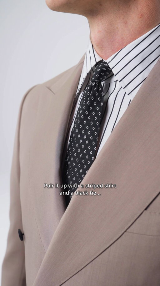 Groom or guest? According to our Style Director Marc, it’s all about the right styling. He first opts for a taupe double-breasted suit with a striped shirt and black tie. For grooms, an off-white wool-silk-linen suit keeps things light, while a tank top and loafers offer a more relaxed take on wedding dressing. Discover the looks in-store & online.