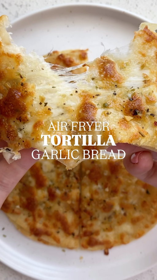 One of my favourite trending recipes of all time - SO worth the hype. Seriously so good. 

And only 5 ingredients, HELLO. In case you haven’t noticed, easy and approachable recipes are my fav 🙌🏻

Comment “recipe” and I’ll send the full printable recipe, macros, tips and tricks straight to your DM’s! https://basicswithbails.com/popular/air-fryer/air-fryer-tortilla-garlic-bread-easy-tiktok-recipe/

INGREDIENTS -
Tortillas
Butter (or avocado oil spray for less indulgent, lower cal version)
Mozzarella cheese
Garlic powder
Italian seasoning

#airfryerrecipes #airfryergarlicbread #garlicbreadrecipe #airfryertortilla