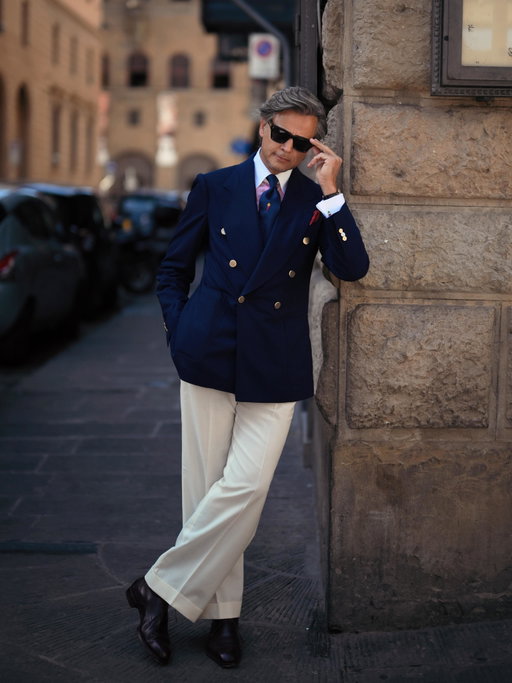 Some lessons are never taught with words. The classic blue double-breasted blazer paired with a striped shirt was always my father’s signature ambassador look. He passed that timeless style on to me when I was just six years old.
Years later, nothing has changed.

Some clothes never go out of style because they carry something far more valuable than fashion—they carry memories, tradition, and the quiet elegance of the man who taught me what true style means. Photos by @thestoryalist