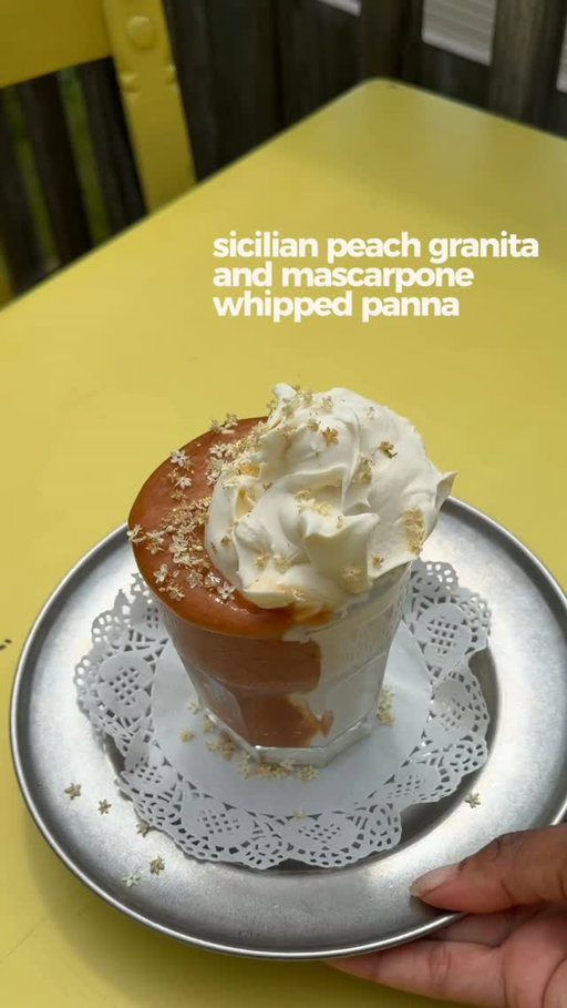 This granita has my taste buds convinced I’m in Sicily, even if my view says otherwise :)

Sicilian Peaches + Cream Granita:
 - 6 ripe peaches, pitted, sliced and frozen overnight
 - Juice of 1 lemon
 - 5 tbsp powdered sugar

Instructions:
Blend all ingredients together until completely smooth using a high speed blender. Transfer to a container and freeze overnight. Prior to serving, allot granita to thaw until slightly firm but still scoopable.

Mascarpone Whipped Panna:
 - 1/2 cup mascarpone
 - 1 cup heavy cream
 - 1 teaspoon vanilla extract
 - 3 tablespoons powdered sugar

Add all ingredients to a bowl and whisk with a stand mixer or hand mixer until light, fluffy, and thick.

To serve, layer the mascarpone panna and granita in a small glass and enjoy!