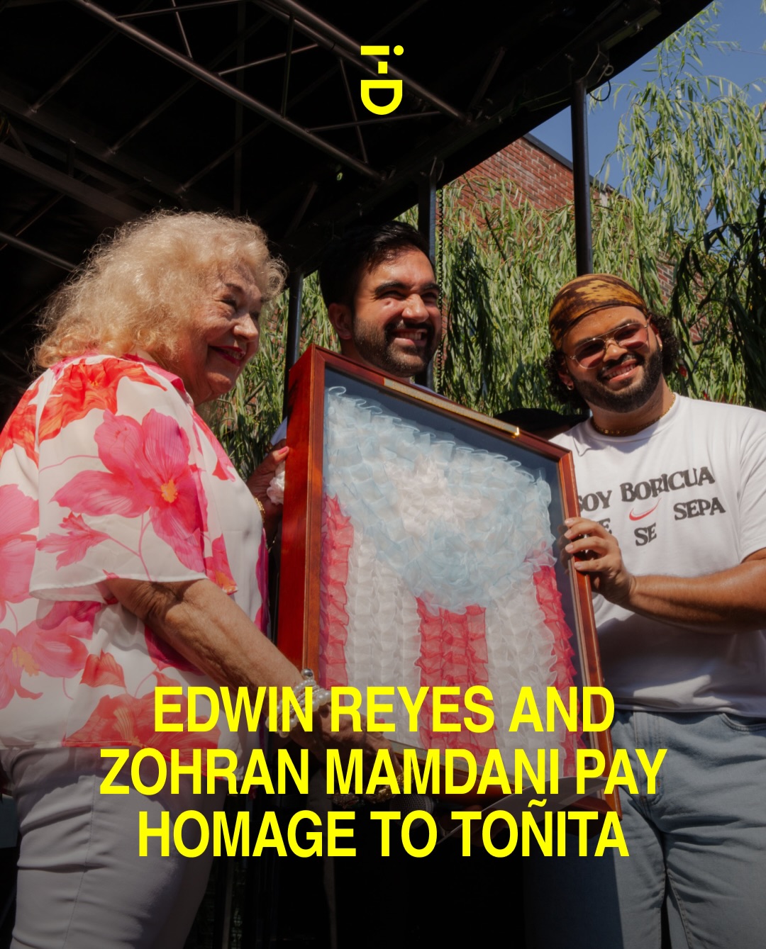 Earlier today at the third annual @tonitasny Fest in Williamsburg, @nycmayor zohrankmamdani presented Toñita—the iconic Puerto Rican matriarch—with “Bandera Viva”, an original piece of art made in her honor by @edwinreyes.nyc. 

”Toñita came to New York City and built a home for an entire community. For 50 years, she has fed her neighbors, welcomed Puerto Ricans searching for belonging, and made sure Brooklyn always carried a piece of the island with it,” Mayor Mamdani tells i-D, exclusively. At the link in bio, @nrips speaks with Reyes and Mayor Mamdani about the community and legacy that Toñita has crafted through the years. 

Toñita Fest photographed by @ramonadai 
Process pictures and video by @edwinreyes.nyc