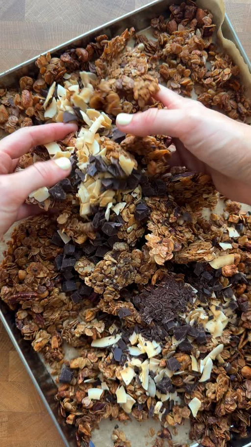 EP 4: ‘CLEAR OUT THE CUPBOARD’ GRANOLA

We’re SO close to our move now, so the Big Kitchen Clear Out is still very much underway !! This time we’re tackling all my half used bags of nuts, seeds and oats. I completely threw this together to use them up and somehow ended up making one of the nicest granolas I’ve ever had 🤣 It’s been on repeat for breakfast every day this week, so consider this your sign to rummage through those cupboards and do the same ⭐️

▫️300g rolled oats ▫️200g (approx.) mixed nuts, roughly chopped ▫️50g seeds of choice ▫️1 tsp cinnamon ▫️Pinch of sea salt ▫️60g honey ▫️70ml olive oil ▫️Coconut flakes ▫️100g salted dark chocolate, roughly chopped

Method:
1. Preheat the oven to 170C fan.
2. Combine the oats, nuts, seeds, cinnamon and salt.
3. Mix together the honey and olive oil until combined. Pour into the dry ingredients and stir until everything is evenly coated.
4. Tip onto a large lined baking tray, spread into an even layer and press down slightly with the back of a spoon.
5. Bake for 20 minutes, then stir, bringing the toasted edges into the middle and the paler mixture to the outside so everything cooks evenly. Bake for a final 10 minutes.
6. Leave to cool completely (at least 45 minutes) without stirring to help those lovely clusters form.
7. Stir through the coconut flakes and chopped dark chocolate once completely cool, then transfer to an airtight jar.
ENJOY!!

#homemadegranola #breakfastideas #batchcooking #highfibrebreakfast #simplefood