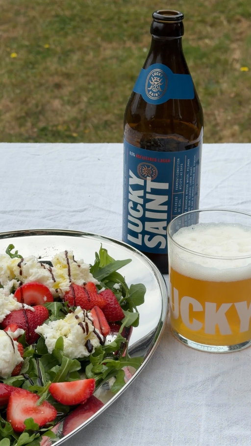 Wimbledon, Served.

Strawberries, sunshine, and a great match on Centre Court. Some rituals are worth keeping.

Whether you’re hosting friends in the garden or watching every game from the sofa, this simple side salad is made to pair perfectly with a chilled Lucky Saint Superior Unfiltered Lager.

Strawberry, Burrata & Basil Salad
Serves: 3-4
Ingredients
250g British strawberries, halved
2 burrata
Handful of fresh basil leaves
Rocket
Extra virgin olive oil
Balsamic glaze
Sea Salt
Black pepper

#wimbledon #summerrecipes #strawberryseason