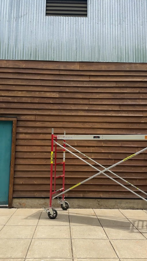 Scaling up for heavy-duty exterior work. The two-tier SCAFFLEX setup goes up fast with zero tools required—giving your crew a stable platform built for the toughest conditions.