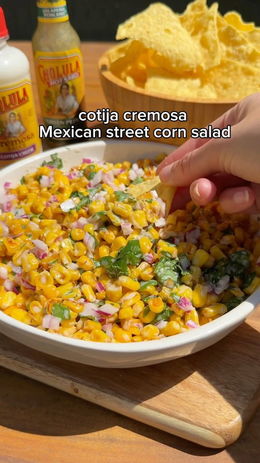 every summer cookout needs this street corn salad side 🌽

Ingredients
1 tablespoon oil
1 package (16 ounces) frozen corn, thawed
1/2 cup finely chopped red onion
1/3 cup Cholula Cremosa Cotija Cheese
3 tablespoons fresh lime juice
2 tablespoons Cholula Green Pepper Hot Sauce
1/4 cup chopped fresh cilantro

Instructions
1 Heat oil in large skillet on medium-high heat. Add corn; cook until lightly charred, stirring occasionally, about 10 minutes. Set aside to cool.
2 Mix Cremosa, lime juice, Green Pepper Hot Sauce and cilantro until well blended and smooth.
3 Mix corn and red onion in serving bowl. Add Cremosa mixture, stirring gently to mix. Sprinkle with additional cilantro to serve, if desired.