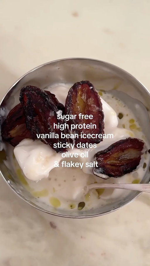 Hot girls love a @ninjakitchenuk Creami 🍨🫦 THE RECIPE:

Sugar free, high protein vanilla bean icecream w/ sticky crispy dates, olive oil and flakey sea salt.

- 1 to 2 scoops vanilla protein whey powder (more protein powder, thicker creami!)
- milk of choice I use organic dairy or almond milk (fill to ninja creami line) 
- 1 scoop unflavoured collagen 
- 1/2 tsp vanilla bean paste (high quality, not extract)

Freeze overnight. 

Melt butter, pan on high heat, place halved mejool dates (cut side down) and fry on each side. Place to one side to cool a little.

Spin Ninja Creami to preferred consistency and add more milk if you need.

Serve with extra virgin olive oil drizzle and flaked Maldon sea salt. 

Voila 🫦
