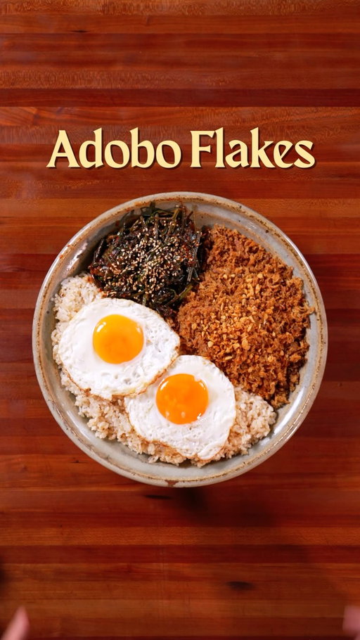 🇵🇭 Adobo Flakes w/ Pako Kimchi 🇰🇷 collab w/ @chefboylee 

Here’s my take on the best way to have your leftover adobo by making it into yummy crunchy strands. Usually we have it w/ Vinegar or a sort of pickle. We have a special guest today so we decided to pair it with a  quick kimchi made with an indigenous edible fern called “Pako” known for its addicting crisp texture!

Also using my take on a pre-colonial Adobo Recipe called “Adobo sa Puti” that doesn’t use soy sauce so it retains a golden color when toasted :)

*we kinda measured by feel so these measurements are just estimates. taste and season as you go!

INGREDIENTS:

Adobo:
- Banana leaves
- Pork lard as needed
- 1 kg of pork shoulder, cubed
- 5-10 bay leaves
- 1 tbsp of peppercorns
- Salt to taste 
- 20-30 cloves of garlic, or to your hearts desire
- 5-6 of long green chilies
- ¼ cup of fish sauce
- ⅔ cup of coconut vinegar (or white vinegar) 
- Water as needed

Pako: 
- 500g of pako or fiddlehead fern, chopped
- Salt
- Hot water
- Ice 

Kimchi blend:
- 1/2 cup garlic
- 1 onion, chopped
- 1-2 mangoes, chopped
- 1 cup cooked rice
- ¼ cup sugar
- 1-2 tbsp fish sauce
- Water as needed
- Gochugaru as needed
- 1 bunch garlic chives

Others:
- Fried egg
- Garlic rice

INSTRUCTIONS: 
- For the adobo, add all the ingredients under “Adobo sa Puti” into a pot. cook for 1–2 hours on low, or until the pork is tender. shred into flakes
- Fry the shreds on low heat w/ a little oil/lard until crispy and golden.
- For the pako , add salt and pour over hot water. immediately shock it in ice water.
- For the kimchi base, blend all ingredients under “Kimchi Blend,” except for the gochugaru and chives. Transfer to a bowl, mix in gochugaru, chives and pako and toss until well coated.
- Serve with garlic rice, fried egg and enjoy!

#cookingasmr #asmr #filipinofood