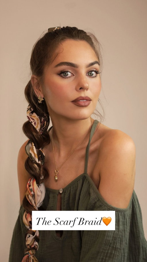 How To: The Viral Scarf Braid 💚

How I style the dragon braid ponytail with an added scarf. This hairstyle is great for making fine hair look thicker🫶🏼

Step-by-step☀️
1. Create a high pony
2. Feed scarf above the elastic
3. Wrap scarf around the pony & secure with a mini elastic
4. Dragon braid until you run out of scarf
5. Splice in a second scarf the same way if needed, then continue the dragon braid or switch to a regular braid, securing with a mini elastic

I went with boho styling and added texture to the front pieces!

#ScarfBraid #ViralHair #Hair #HairTutorial #Ponytail