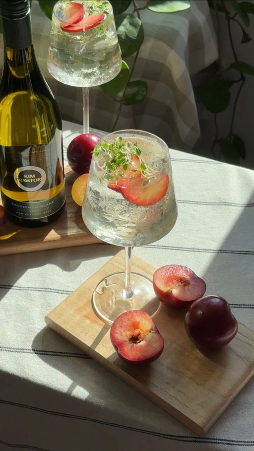#KimCrawfordPartner Plum + thyme wine spritzer with @kimcrawfordwine - summer in a glass!!

The only hosting move you need this season, IMO! Kim Crawford Sauvignon Blanc is the base here with notes of passion fruit & grapefruit - perfectly crisp. 

Want a lighter pour? Swap in Kim Crawford Illuminate Sauvignon Blanc, that has the same signature quality with effortless summer energy. *Lower in calories (70 cal/serving) and lower in alcohol at 7% ABV. 

You can find both bottles at @Safeway, @Pavilions and @instacart. Link in bio!

#KimCrawford #ClubKim #BringKim #21+

Please enjoy responsibly! ©2026 Constellation Imports, Rutherford, CA USA

*Per 5 fl. oz. serving of average analysis: Calories 70, Carbs 4.0 grams, Protein 0.0 grams, Fat 0.0 grams as compared to Kim Crawford original Sauvignon Blanc per 5 fl. oz serving average analysis, Calories 120, Carbs 3.0 grams, Protein 0.0 grams, Fat 0.0 grams.Kim Crawford Illuminate Sauvignon Blanc 7% alc/vol compared to Kim Crawford Sauvignon Blanc 12.5% alc/vol
