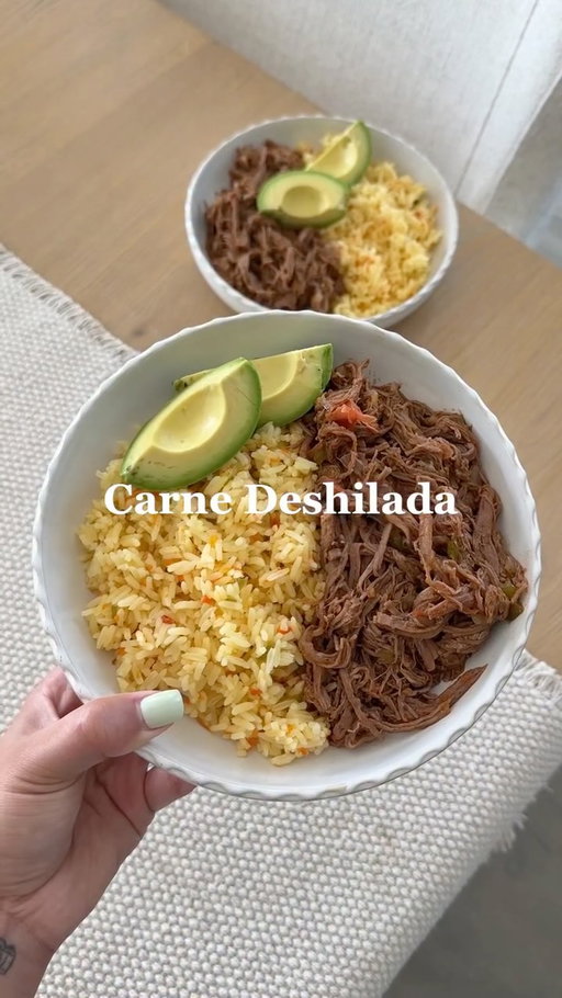 Carne Deshilada recipe 🇸🇻 ⬇️

2 lbs flank steak
1 onion
Garlic cloves
Bay leaf 
Salt
Beef bouillon
1 Green bell pepper
1 Red bell pepper
1 onion 
2 tomatoes
Tomato paste
1½ cups reserved beef broth
1 tsp yellow mustard
Cumin 
Oregano 
Beef seasoning
Salt and black pepper, to taste

Place the flank steak in a pot with the onion, garlic, bay leaves, salt, beef bouillon, and enough water to cover. Bring to a boil, then reduce to a simmer and cook for about 2 hours, or until the beef is tender.

Remove the beef and reserve 1½ cups of the broth. Shred the beef and set it aside.

Heat the oil in a skillet and sauté the peppers and onion until softened. Add the tomatoes and cook for 2–3 minutes. Pour in the reserved broth and stir in the mustard, cumin, oregano, beef seasoning, salt, and pepper.

Add the shredded beef back to the pot and simmer for 25–30 minutes.

Salvadoran Rice recipe ⬇️

2 cups jasmine rice
1 tomato, diced
⅓ green bell pepper, diced
½ onion, diced
½ cup shredded carrots
1 tbsp oil
1 tbsp chicken bouillon
2½ cups water
Salt, to taste

Heat the oil in a large pot over medium heat. Add the tomato, green bell pepper, onion, and shredded carrots. Sauté for 2–3 minutes until the vegetables begin to soften.

Add the rice and stir for 1–2 minutes to lightly toast it. Pour in the water and stir in the chicken bouillon and salt. Mix well and bring to a boil, stirring occasionally so the rice doesn’t stick.

Once the water has mostly evaporated, reduce the heat to low, cover, and cook for 18–20 minutes. Turn off the heat and let the rice rest, covered, for 15 minutes before fluffing with a fork and serving.
•
•
•
•
@imusausa @getgraza @caraway_home @target #carnedeshilada #comidasalvadoreña #elsalvador #elsalvador503 #elsalvadorimpresionante