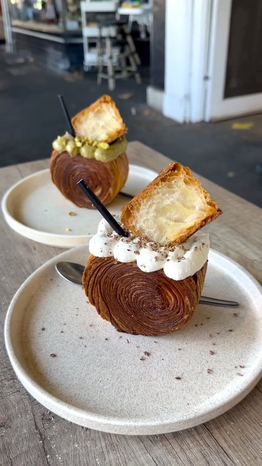 📍📍HERE📍📍

Follow @brittandmitchworldwide for more epic Melb food spots 🍽️☕️

Croissant… or hot chocolate? Why not both? 🤯🥐🍫

When we saw these croissant wheels from Calle Bakery in Carlton North we knew we HAD to try them and WOW!!!! They live up to the hype! They are lined with a chocolate ganache, filled with hot chocolate, and they come in two flavours… the OG hot chocolate and the Dubai pistachio hot chocolate. 🤤 

Only available Friday-Sunday for limited time so don’t miss out! @callebakery 

Which one are you choosing… OG or Dubai Pistachio? 👇

#melbournefood #melbourneeats #melbournecafes #visitmelbourne #bakery