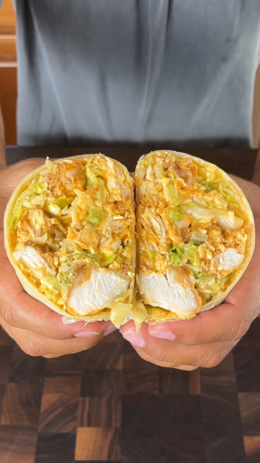 Spicy Garlic Buffalo Chopped Wrap 

Crispy chicken tenders get tossed @cusos spicy garlic buffalo then get piled onto a bed of lettuce with blue cheese dressing, Buffalo sauce, and blue cheese crumbles. 

Everything gets chopped and stuffed into an XL tortilla 

This wrap is spicy, creamy, and SOOO good

Follow @domtuttobene to make you a better cook at home 🏠 

Ingredients: 

- Chicken tenders 
- Lettuce 
- Blue cheese crumbles
- Blue cheese dressing 
- Buffalo Sauce 
- XL tortilla