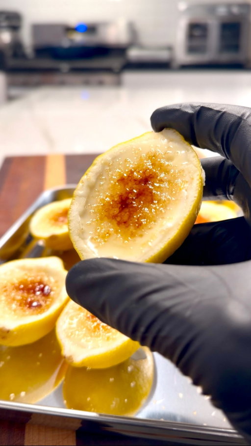 I saw these lemon desserts going around and had to try them myself. 🍋🍋🍋

Simple ingredients, chilled until set, then finished with a little brown sugar on top. Nothing crazy, just one of those desserts that looks way harder than it actually is.

Definitely worth making.

Lemon Brûlée Posset

Ingredients

4 large lemons (washed) 
1 1/2 cups heavy cream
1/2 cup sugar
3 Tbsp fresh lemon juice
2 to 3 Tbsp brown sugar for topping

Instructions

Slice 3 of the lemons in half lengthwise, then carefully scoop out the flesh while keeping the lemon shells intact. Set the lemon shells aside.

Squeeze or press the lemon flesh through a fine mesh strainer until you have about  3 tablespoons of lemon juice. Set the juice aside.

Zest the 4th lemon and add the zest to a saucepan with the heavy cream and sugar.

Bring the mixture to a gentle simmer over medium low heat, stirring often. Let it simmer for about 5 to 8 minutes, or until the cream slightly thickens and coats the back of a spoon.

Remove the saucepan from the heat, then stir in the fresh lemon juice. Let the mixture sit for 2 to 3 minutes so it can start to thicken.

Pour the mixture into the hollowed out lemon shells and place them in the fridge for at least 4 hours, or overnight.

Once set, sprinkle the tops with brown sugar and use a kitchen torch to melt and caramelize the sugar.

Let the sugar harden, then serve cold.

#lemon #dessert #food #foodstagram #instafood