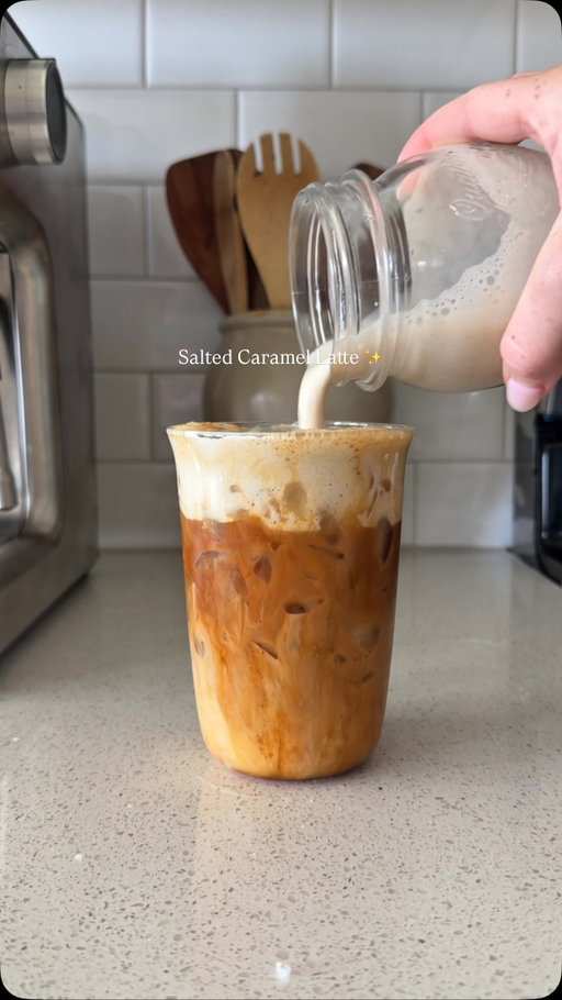 Salted Caramel latte season is every season 🤎☕✨

This iced caramel latte is creamy, dreamy, and made even better with @sownplantbased SOWN Salted Caramel Organic Oat Creamer. The perfect little afternoon pick-me-up!

✨ SALTED ICED CARAMEL LATTE RECIPE ✨

• 2 espresso shots • 1 tbsp caramel syrup • Pinch of salt • Ice • SOWN Salted Caramel Organic Oat Creamer
* @califiafarms Oat Barista Blend 

Cold Foam: • 1 tsp caramel sauce or syrup 
• 2 tbsp SOWN Salted Caramel Organic Oat Creamer

Directions:
1. Brew espresso directly over caramel syrup and a pinch of salt.
2. Stir to combine and fill your glass with ice.
3. Add Cailifa Farms Oat Barista Blend and a splash of SOWN Salted Caramel Organic Oat Creamer.
4. Froth together the SOWN Salted Caramel Organic Oat Creamer until light and fluffy.
5. Top your latte with the cold foam and enjoy

The caramel flavor is SO good and makes every sip taste like a coffee shop treat at home. 🤎✨ #IcedLatte #CaramelLatte #CoffeeLover #SownCreamer HomeCafe