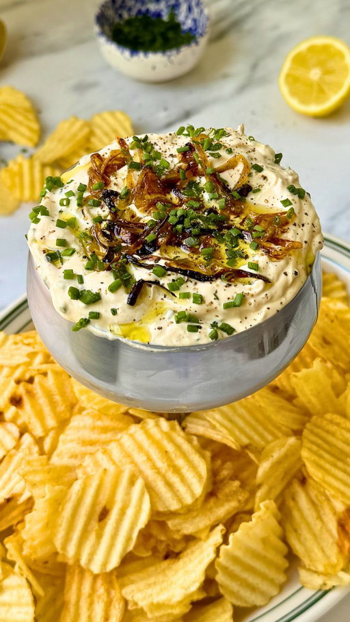 A five star snack moment 🤤 @larabuchar 

Catch Five Star Weekend streaming now on @STACKTV ✨

RECIPE

INGREDIENTS:

1 white or yellow onion, sliced
Extra virgin olive oil
½ tsp salt
½ pepper, plus more for garnish
1 cup sour cream
¼ cup mayonnaise
1 Tbsp lemon juice (1/2 lemon, juiced)
2 Tbsp chives, finely chopped, plus more to garnish
1 tsp garlic powder
Potato chips, to serve

DIRECTIONS

	1.	Preheat oven to 400F.
	2.	Arrange onion slices on a baking sheet, drizzle generously with olive oil and sprinkle with salt and pepper. Toss to coat, then roast for 30 minutes until onions are crispy on the edges, then set aside to let cool.
	3.	In a large bowl, combine ¾ of the onions, sour cream, mayonnaise, lemon juice chives, and garlic powder.
	4.	Pour into a small serving dish, then top with remaining onions, additional chives, additional black pepper and olive oil to taste. Serve with potato chips.