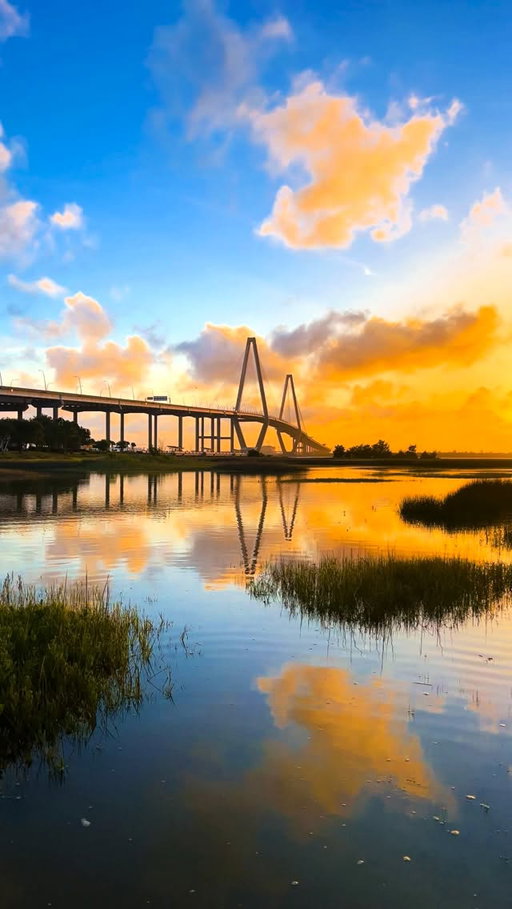 🌅 21 years. One iconic Charleston landmark.

Today we’re celebrating 21 years of the Ravenel Bridge!

Since opening on July 16, 2005, it’s become more than just a way to get from one side of the Cooper River to the other. It’s the backdrop for sunrises, sunsets, Bridge Runs, family photos, boat rides, and countless Charleston memories.

Whether you drive across it, walk or bike the pedestrian path, relax beneath it at Waterfront Park, or cruise under it on the water, there’s no wrong way to experience one of the most recognizable landmarks in the Lowcountry.

Happy 21st Birthday to the Ravenel Bridge! 🌉🎉 Here’s to many more years of connecting Charleston and inspiring millions who cross it each year.