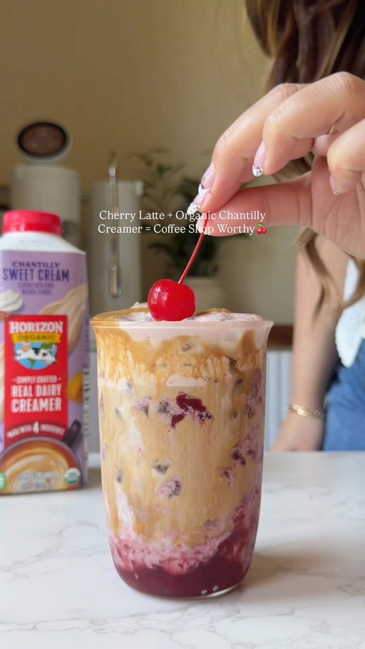 #ad My current drink obsession? My cherry chantilly latte 🍒complete with @horizonorganic Chantilly Sweet Cream Creamer. 
Made with only four ingredients - it gives every sip the perfect creamy, velvety finish. It turns a homemade latte into a coffee shop worthy treat every time.
Who’s trying this combo? ✨

Recipe: 
Ingredients

1 tbsp homemade cherry syrup
1 tsp vanilla bean paste
2 shots of espresso

Cold Foam

1 tbsp homemade cherry syrup
A splash of Horizon Organic Chantilly Creamer

Froth the cold foam until it’s light and super fluffy. Pour it over your latte and enjoy 😉 

 #horizonsponsored #CherryLatte #HomeCafe #horizon