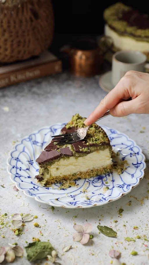 Do you still enjoy the flavors of Dubai chocolate? I know I do ☺️

You can also find the recipe on my website.

Dubai Chocolate Cheesecake

Ingredients:
For the Crust:
2 cups kataifi
5 tbsp butter, separated
1/3 cup granulated sugar
1/2 cup crushed raw Turkish pistachios
Pinch of salt 

For the Cheesecake Batter: 
3 8 oz (678g) packages cream cheese 
1/3 cup (80g) sour cream
3/4 cup (180g) heavy cream
1 cup (200g) granulated sugar
2 tbsp (17g) all-purpose flour
1/2 tbsp (5g) corn starch
1 tsp (5g) vanilla
3 large (155g) eggs 

For the Dubai Chocolate Layer: 
1 1/2 cups kataifi 
1 tbsp peanut oil (optional) 
1 heaping cup (320g) pistachio cream 
1/4 cup crushed pistachios (optional) 
125g high quality chocolate (66% cocoa or to your preference)