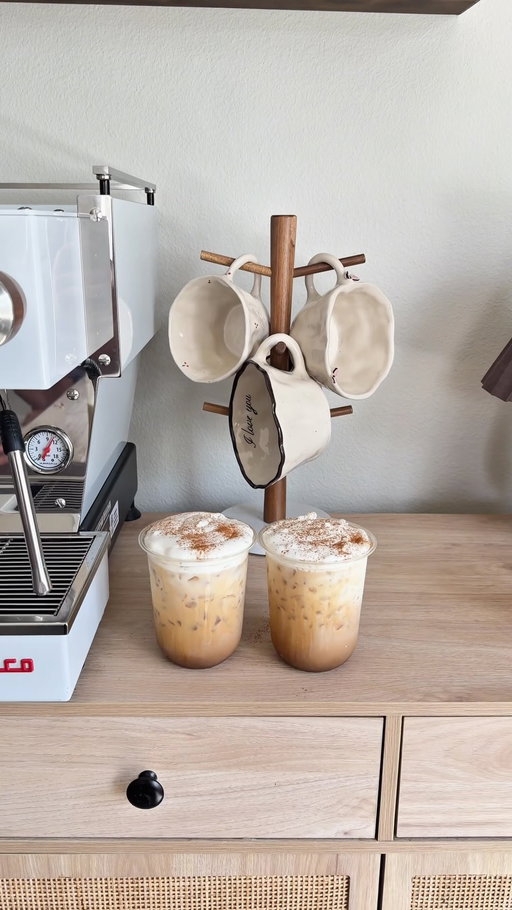 Two homemade lattes to go > coffee shop.🤎

✨Recipe✨

- 1-2 tsp maple syrup 
- pinch of salt 
- double shot of espresso 
- tons of ice 
- milk of choice 
- vanilla cold foam ( optional ) 
- finish with a dash of cinnamon 

Enjoy⭐️

#homebarista #espresso #coffee #coffeelover #icedcofferrecipes