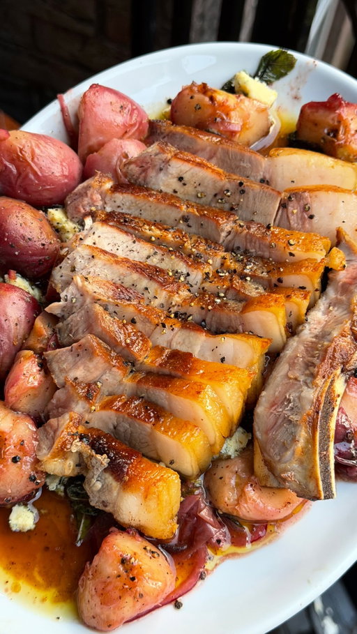 a true summer classic! Pork and peaches. This sweet and salty dish is perfect for this heat. It’s not too heavy and has heaps of flavour!

Recipe:

Pan-Fried Pork Chop with Grilled Peach, Pickled Onion and Blue Cheese Salad
Ingredients

pork chop

1 thick-cut pork chop
Olive oil
Salt
Black pepper
1 knob of butter, optional
1 garlic clove, optional
A few sprigs of thyme or rosemary, optional

salad

3/4 ripe peaches, halved and stoned
Olive oil
A handful of fresh mint leaves
Zest and juice of 1 lemon
1 tbsp sherry vinegar
A handful of ready-made pickled onions, sliced
Blue cheese, crumbled, to finish
Black pepper
Method
Start with the peaches. Cut them in half and remove the stones, before slicing into the wedges. Then drizzle with olive oil. Place them under a hot grill, cut-side up, until softened, lightly charred and caramelised around the edges.
For the pork chop, score the fat with a sharp knife, being careful not to cut into the meat. Season generously with salt and black pepper.
Place the chop fat-side down in a cold pan, then slowly bring the heat up to medium. Let the fat render until golden, crisp and caramelised. This gives you that beautiful crispy edge and releases fat into the pan for cooking.
Once the fat has rendered, lay the pork chop flat in the pan and cook for 3-5 minutes on each side, depending on thickness. You want a deep golden crust on the outside while keeping the meat juicy in the centre. For extra richness, add a knob of butter, garlic and herbs for the final minute, then baste the pork as it finishes cooking.
Remove the pork chop from the pan and rest for 5-10 minutes.
To make the salad, add the grilled peaches to a bowl with the sliced pickled onions, fresh mint, lemon zest, lemon juice, sherry vinegar, a drizzle of olive oil and black pepper. Toss gently so the peaches stay intact.
Slice the pork chop, then serve with the grilled peach and pickled onion salad. Finish with crumbled blue cheese, extra mint and a final drizzle of olive oil. #tasty #foodie #tapas #cooking