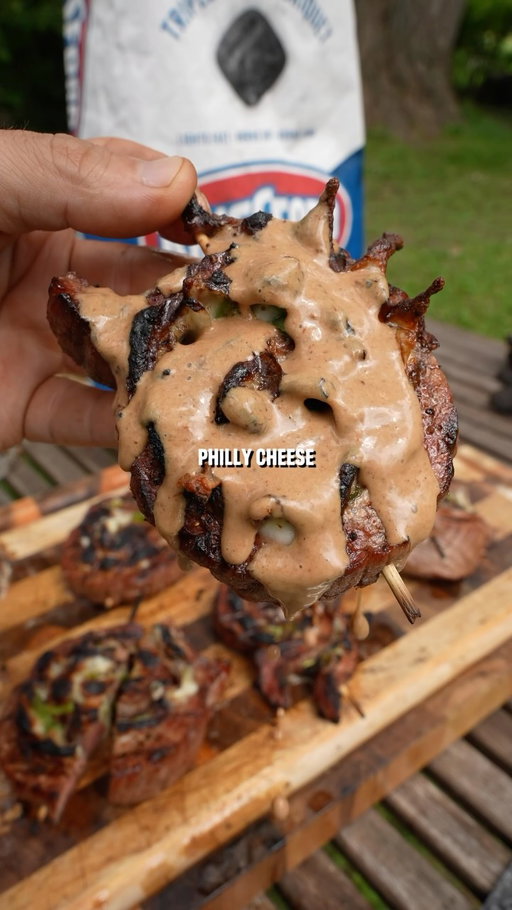 Philly Cheese Flank Steak Pinwheels

Recipe:
-Start by butterflying a flank steak and opening it up flat. 
-Top it with provolone cheese, green peppers, and onions. Season it with salt, pepper, and garlic. 
-Roll it up tightly, skewer it, and slice between the skewers. 
-Season on the outside and grill over direct heat on both sides until steak hits desired doneness. 

#steak #cheesesteak #phillycheesesteak #flanksteak #grilledsteak