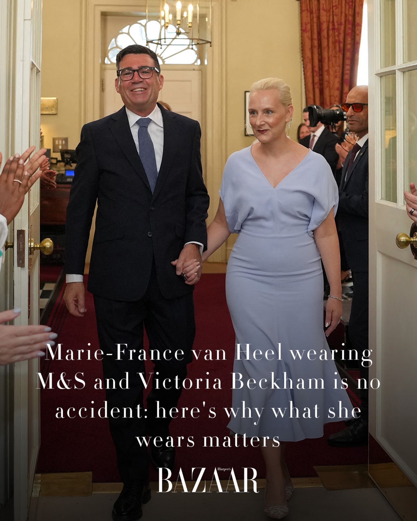 “Andy Burnham had barely been Prime Minister 10 minutes when the world’s press began analysing the sartorial choices of his wife, Marie-France van Heel. The Dutch-born chief marketing officer was welcomed into No.10 wearing a pale blue Victoria Beckham dress, currently on sale at Farfetch for £719.

“Few could question the choice of brand. Beckham is, after all, British, and women in political (or even political-adjacent) roles are expected to wear clothes by home-grown designers as a means of giving them visibility. Any contention will come from the price tag, which some will say is incongruous with her husband’s ‘man of the people’ USP. There is still a long-held school of thought that says one cannot hold socialist principles unless they live as modestly as an 18th-century Presbyterian monk.”

At the link in our bio, @ella_alexander1 explores why what Marie-France van Heel wears matters.