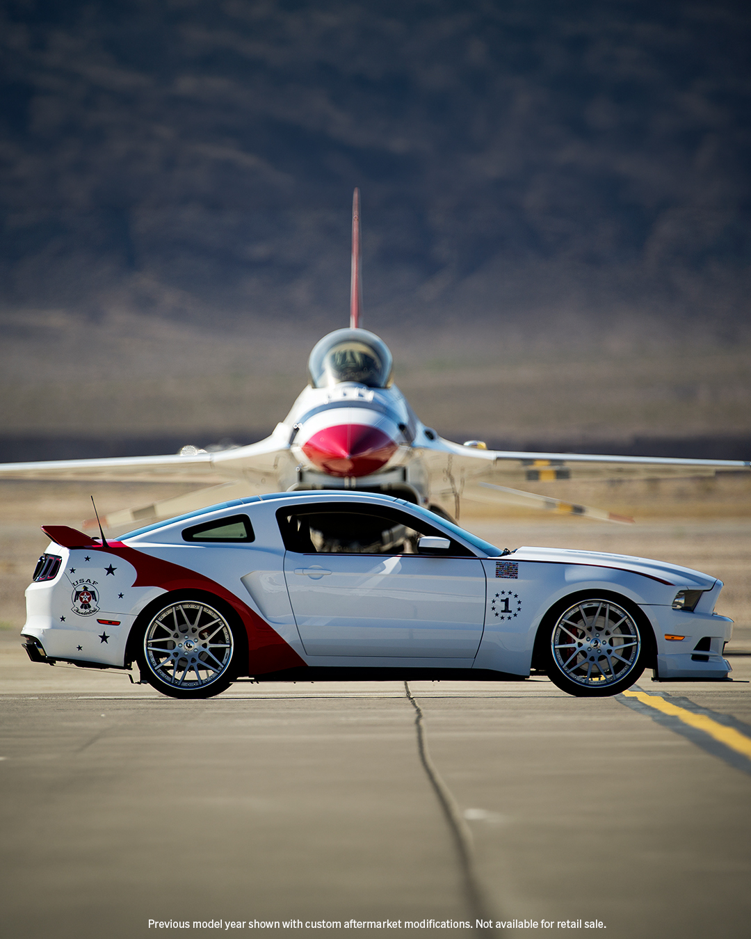 Inspired by the skies. Designed for the streets.

In 2014, Ford unveiled the USAF Thunderbirds Ford Mustang®, a one-of-one Mustang that pays homage to the United States Air Force Thunderbirds and their F-16 fighter jets.

The Thunderbirds are an elite group of combat pilots who represent the United States Air Force through air shows, flyovers, and aerial demonstrations.