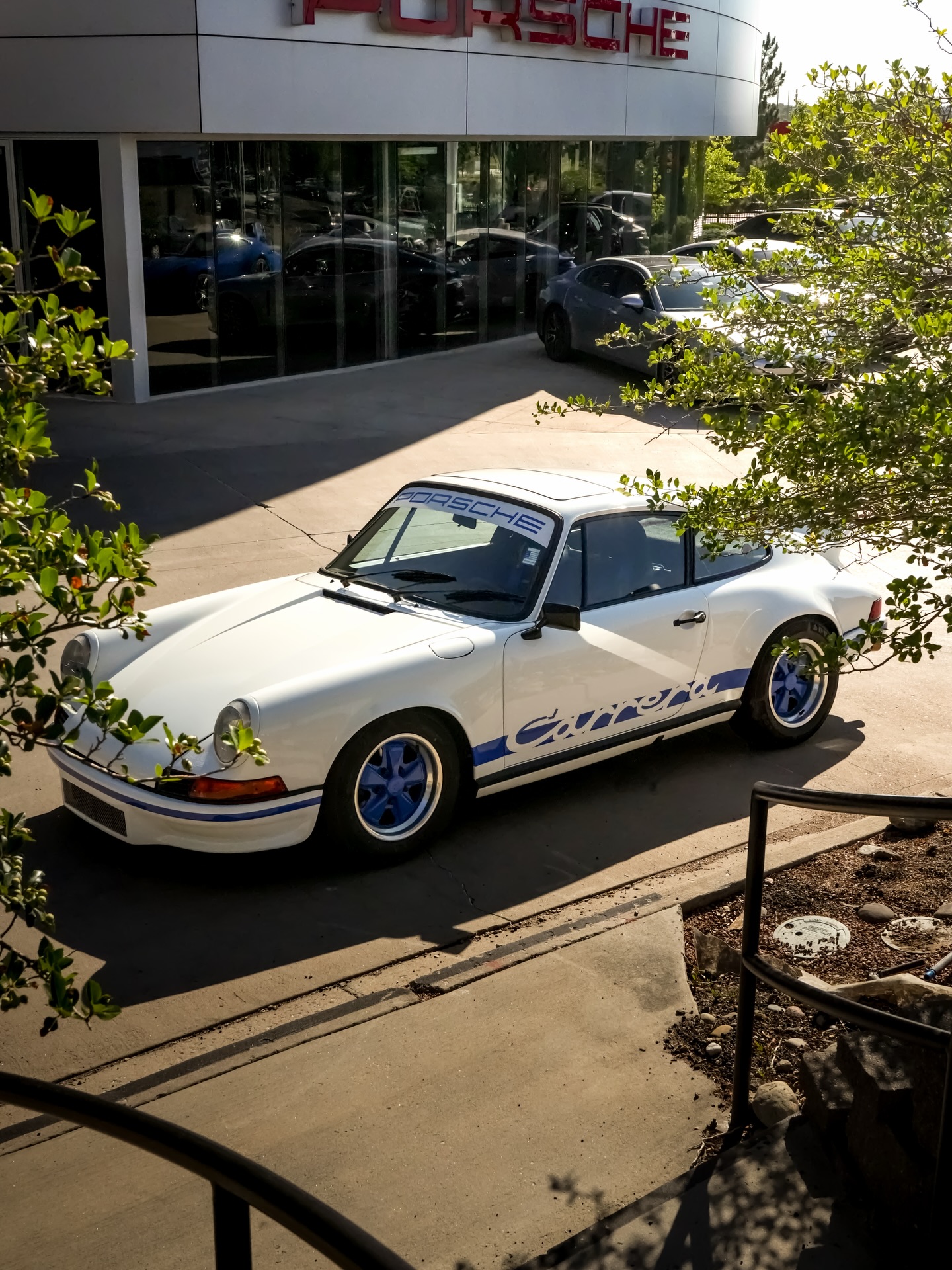 Incredibly fun and very well built ‘73 RS Tribute 911 finished in White over Black interior.  This 911 started new as a 1984 911 Carrera and was converted into a 1973 911 RS Tribute vehicle by Protosport Inc. in 2011 - 2012.  The conversion consisted of composite panels replacing the front fenders, front deck lid, front bumper cover, rear deck lid, and rear bumper cover.  The roof, rear quarter panels, and doors remain original.  The original 3.2L flat-six engine received a top-end rebuild and a 5-Speed G50 transmission was fitted to the car as well.  The car was once part of the Trissl Sports Cars collection and most recently came to us from a long time enthusiast client that kept the car in Arizona for the past 10 years, averaging 1,000 miles of driving per year.  Since the completion of the Tribute conversion the car has been driven fewer than 13,000 miles which has kept the overall condition of this 911 very clean. 

The level of detail to complete this ‘73 RS Tribute was very comprehensive.  The tub of the 911 was completely stripped to bare metal before being painted in the Grand Prix White finish with blue Carrera RS trim.  A partial roll-cage was installed at the time of the conversion as well. 

The original 3.2L engine received new piston rings, rod bearings, intake valves, and the cylinder heads were resurfaced.  A 3.2L Motronic ECU chip was added as well as a new clutch assembly with aluminum Turbo pressure plate.  A high-flow cone air filter was installed and the exhaust was modified to enhance the engines ability to breathe.  A 5-Speed G50 transmission replaced the original 915 transmission to enhance the overall driving character and experience. 

Price: $165,000

#porsche911rs #porsche911 #aircooled #porscheclassic #porsche