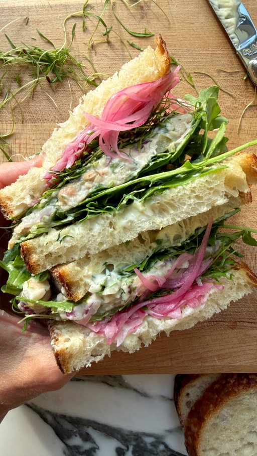 This on repeat all summer long ✨ Recipe below!

Smashed White Bean Dill Pickle Sandwiches

for the filling:
2 cans white beans, drained and rinsed
1/4 cup diced dill pickles
1/4 cup diced celery
1/4 cup diced red onion
2 to 4 tablespoons chopped fresh dill
2 tablespoons Greek yogurt
1 tablespoon fresh lemon juice
1 teaspoon Dijon mustard
1/4 to 1/2 teaspoon sea salt

for the sandwiches:
bread
mayo
arugula
sprouts
pickled onions

In a large bowl, mash the filling ingredients together and season to taste. Assemble sandwiches on the bread with mayo, the white bean filling, arugula, sprouts, and pickled onions.

#sandwichrecipes #highprotein #loveandlemons #beachsandwich #easyrecipes