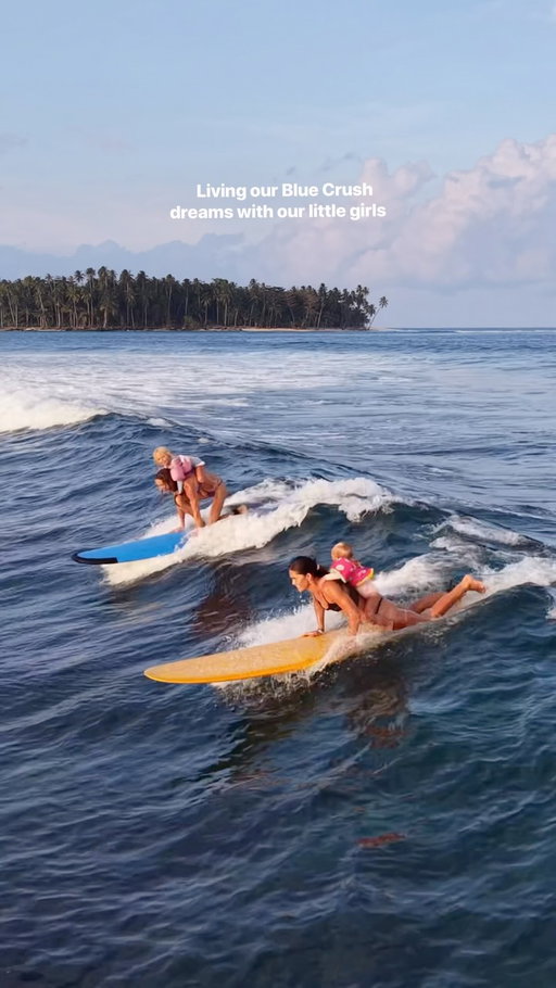PARTY WAVE!! 🏄‍♀️🌸💦The way I dreamed about the Blue Crush life as a teenager growing up in the middle of the prairies of Saskatchewan would make you laugh. I went to school wearing a puka shell necklace, had fake waves painted in my room, and even a fake palm tree! 

If you had told that teenage girl that one day I’d be riding waves with my own kids, I don’t think I would’ve believed you.

Follow your dreams. Sometimes they unfold even more beautifully than you ever imagined. 🤍

This was such a memorable sunset surf with my sis @rocamoons and our babies! The girls giggling as we sang and danced on our boards, and cheered them on is a memory I wish I could bottle up forever. I’m so grateful we have these moments on video. 🥹 Thank you @kanduivillas and @iqbalmentawai !!

#dreambig #surftrip #Mentawais #kanduivillas #family