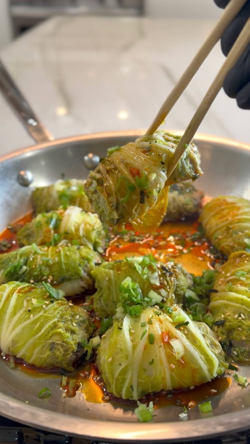 Everyone wants to lose weight until they find out it still takes effort in the kitchen. These cabbage dumplings make that part a whole lot easier. 🥟🥟🔥

Cabbage Dumplings

Ingredients

Ground chicken, 2 pounds
Portabella mushrooms, finely diced, 8 ounces
Scallions, finely sliced, 4
Soy sauce, 2 tablespoons
Oyster sauce, 1 tablespoon
Chicken bouillon powder, 1 teaspoon
Salt and black pepper, to taste
Small Napa cabbage, 1 to 2 heads
Furikake, for garnish
Chili oil, for serving
Sliced scallions, for garnish

Instructions

Bring a large pot of water to a boil. Blanch the Napa cabbage leaves for 45 seconds to 1 minute, just until softened and flexible. Transfer to a towel and pat dry.

In a large bowl, combine the ground chicken, mushrooms, scallions, soy sauce, oyster sauce, chicken bouillon, salt, and pepper. Mix until everything is well combined.

Spoon the filling onto the base of each cabbage leaf. Fold in the sides and roll tightly to seal.

Arrange the dumplings seam side down in a large skillet or steamer. Add 1/4 cup water to the pan, cover, and steam over medium heat for 12 to 15 minutes, or until the chicken reaches an internal temperature of 165 degrees.

Remove the lid and let any remaining water evaporate for 1 to 2 minutes.

Finish with furikake, a drizzle of chili oil, and sliced scallions before serving.

#dumplings #cabbage #healthyeating #food #foodstagram